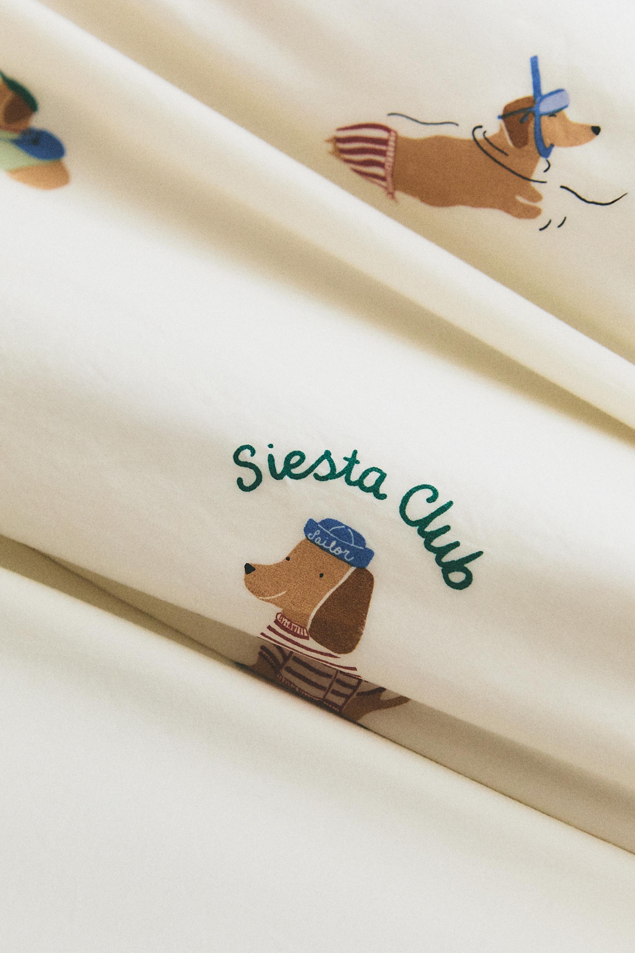COUETTE RÉVERSIBLE ENFANT CHIENS